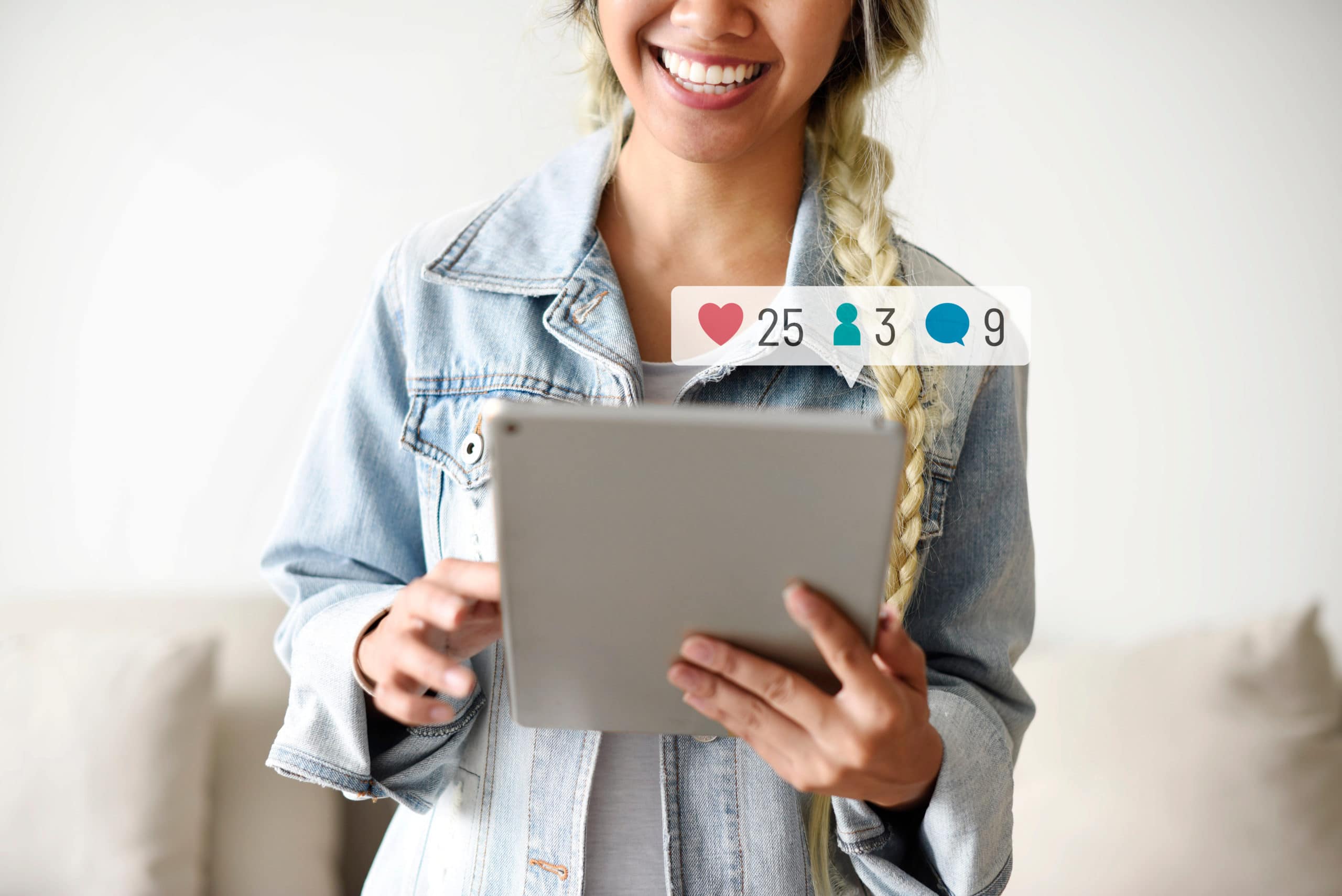 Happy woman using a digital tablet