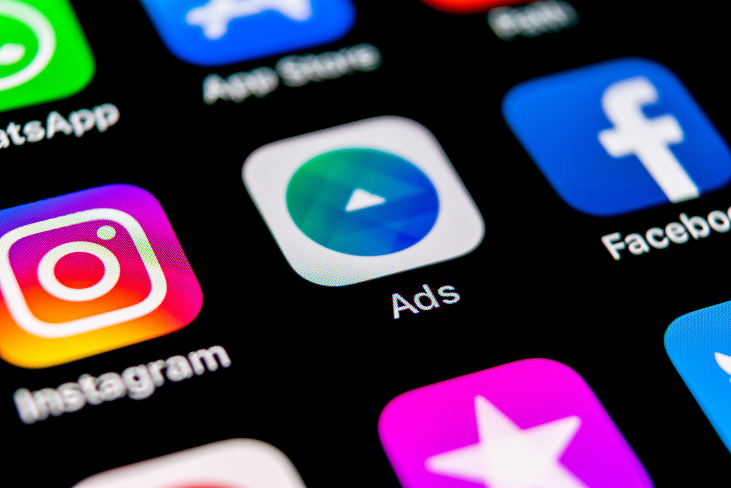 Facebook Ads application icon on Apple iPhone X screen close-up. Facebook Business app icon. Facebook Ads mobile application. Social media network