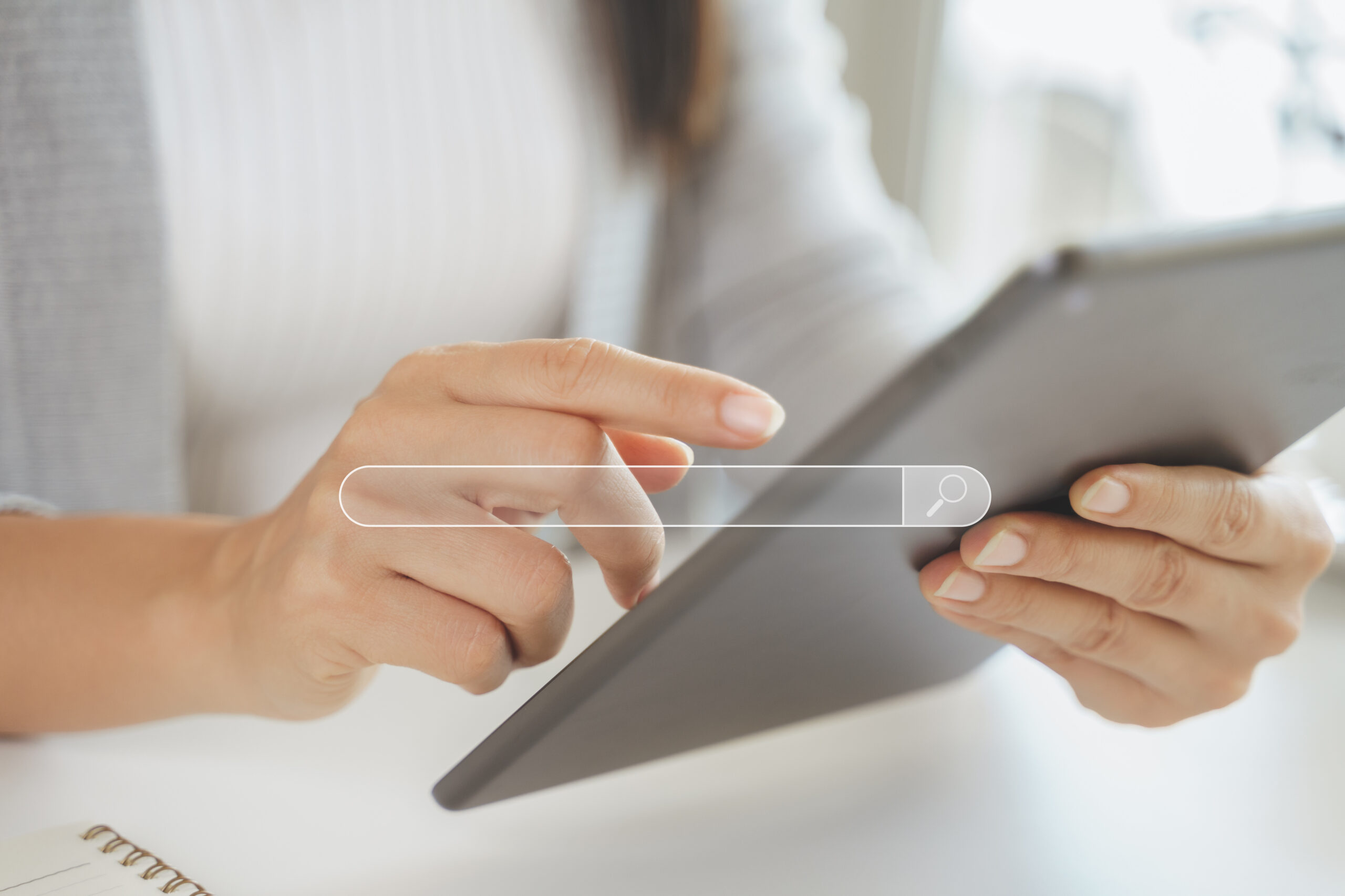 Woman using a tablet to Searching for information with the Search bar, Web browser, Data Search, Search Engine, Technology Concept