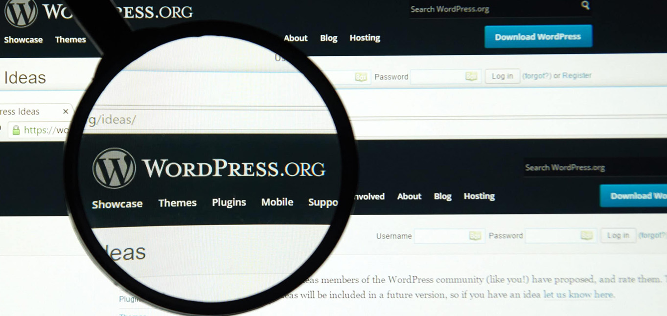 MONTREAL, CANADA - MARCH 5, 2016 - Wordpress web page under magnifying glass.